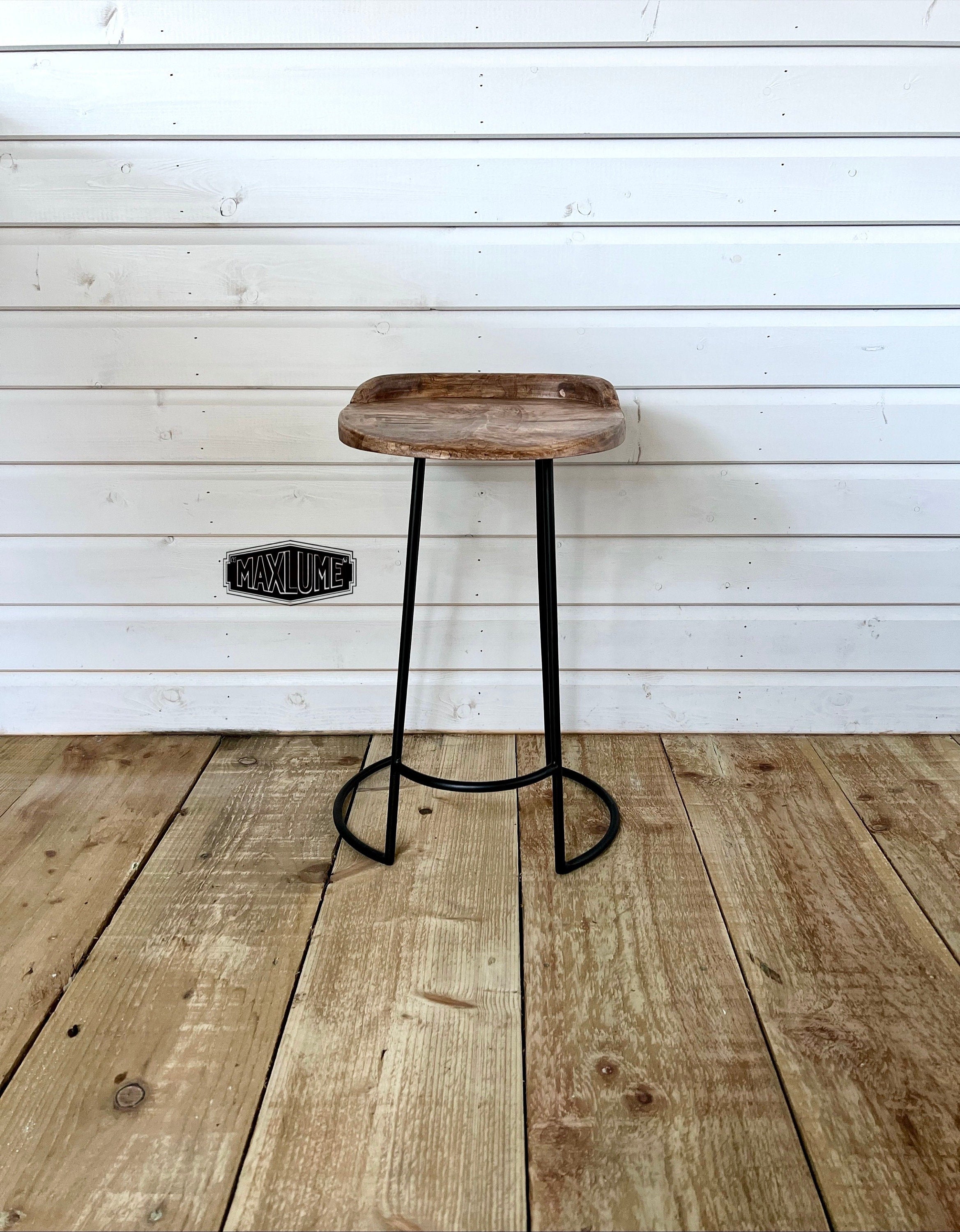 Metal stool deals with wood top